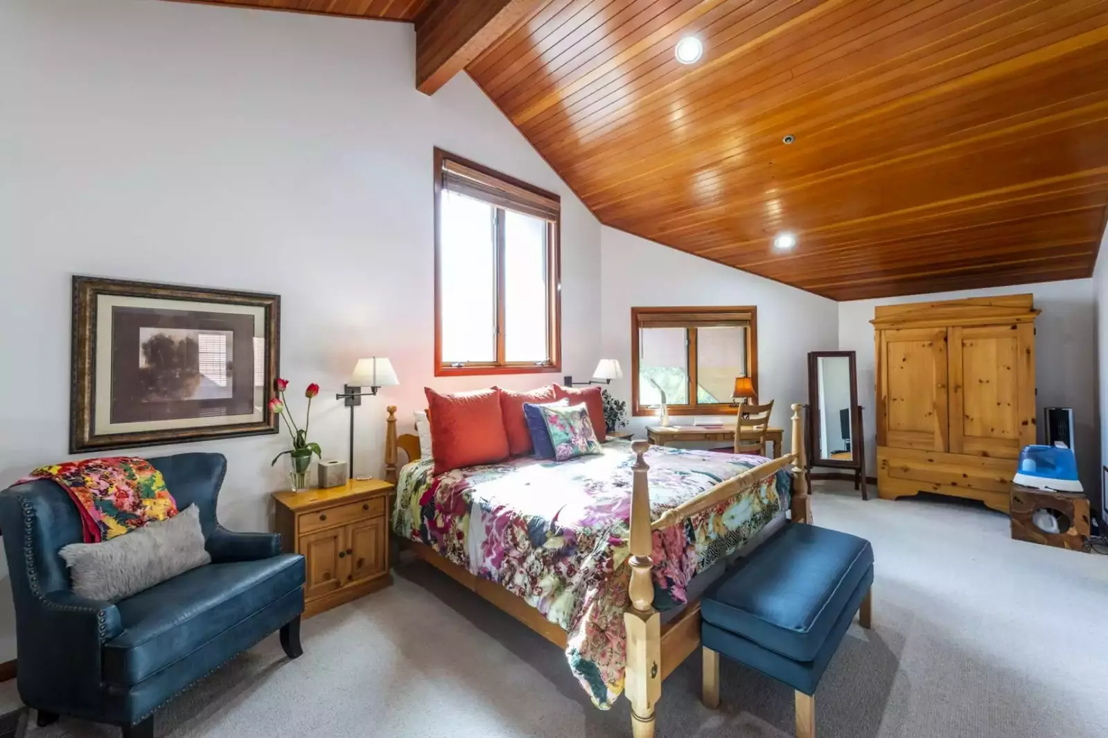 Master Suite Offers A Private Top Floor Oasis - Bright & Cheery Bedroom with King Bed, Office Area, Sitting Area, HDTV and En Suite Bathroom Complete