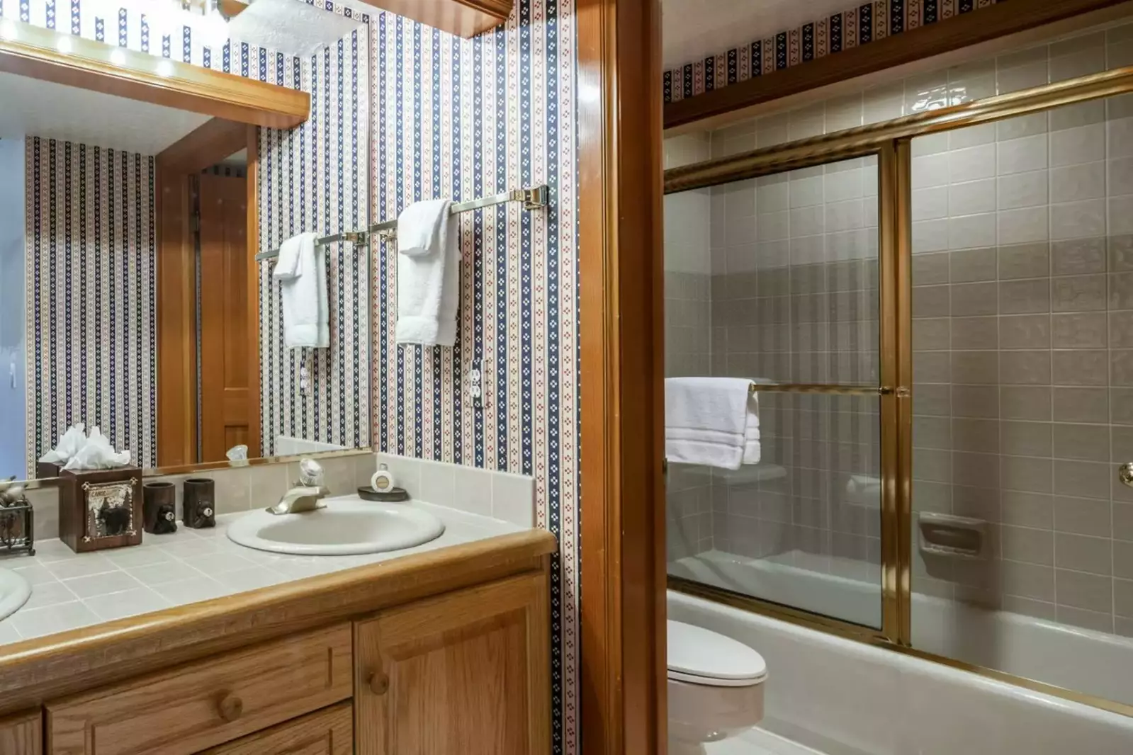Guest En Suite Bathroom Offers Twin Vanities, Separate Toilet/Bath/Shower Area