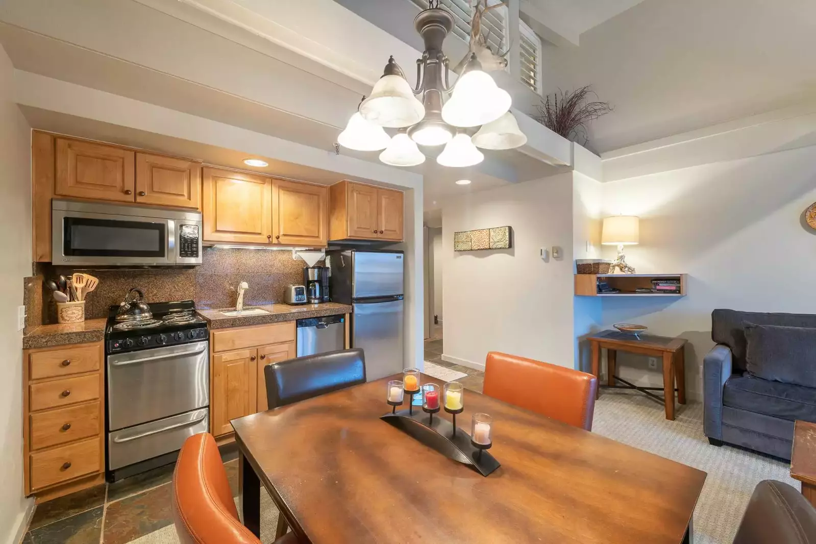 Conveniently Located Off The Kitchen is The Comfortable Dining Room. It has Seating for up to 4 Guests.