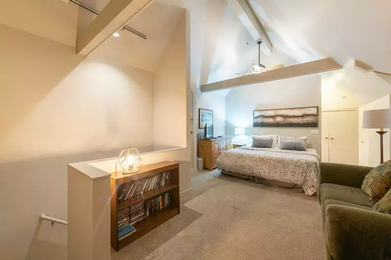 Upstairs Master Suite with Vaulted Ceilings, King Bed, HDTV, Sofa, En Suite Bathroom