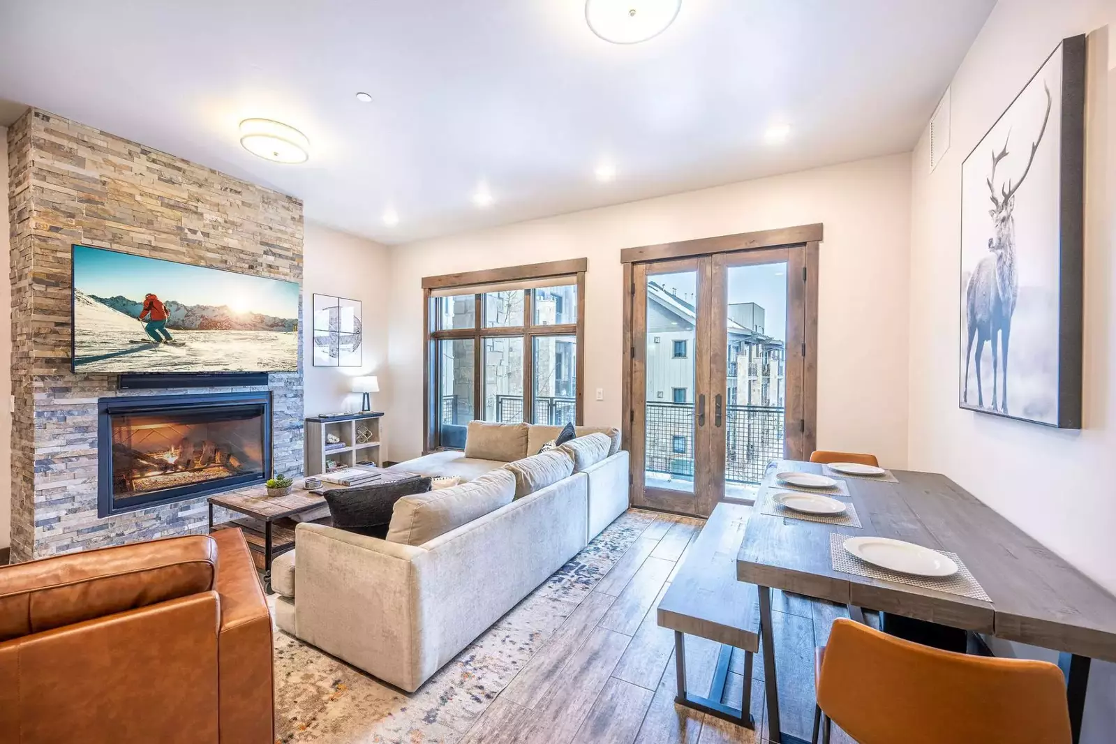 The spacious living room boasts beautiful double doors that open to your private balcony and a dining room table.