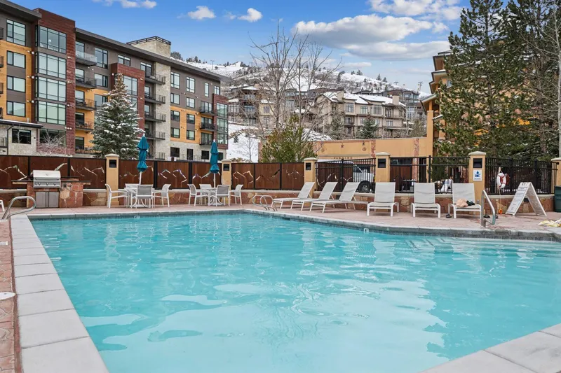 Seasonal outdoor pool at Sundial Lodge, available to guests staying in this Park City Canyons Village vacation rental.