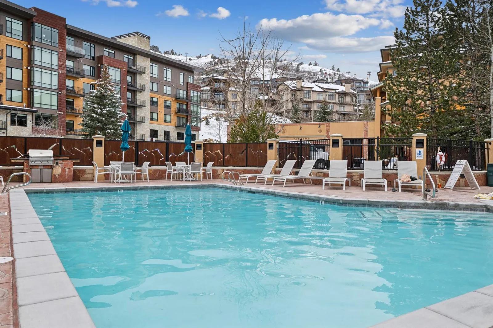 Seasonal outdoor pool at Sundial Lodge, available to guests staying in this Park City Canyons Village vacation rental.