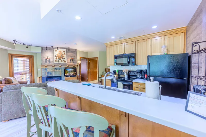 Spacious kitchen island with bar seating—ideal for breakfast or gathering with family and friends.