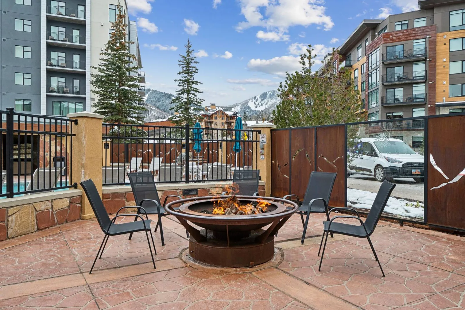Community fire pit at Sundial Lodge, a relaxing après-ski gathering spot in Canyons Village, Park City.