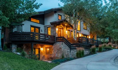 High-end Park City mountain home asymmetrical exterior view in Deer Valley