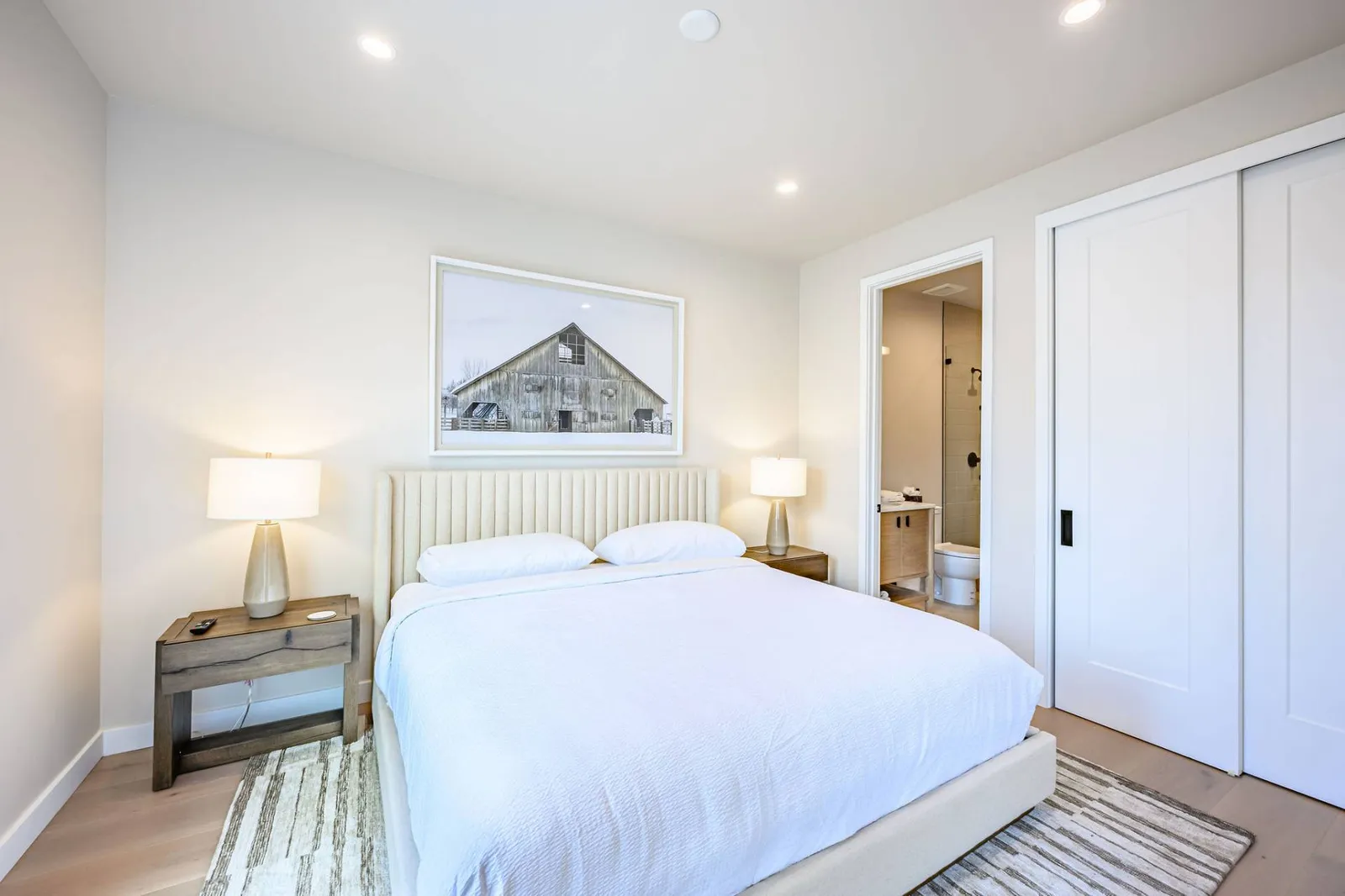 Guest bedroom with king bed and blackout shades in Park City vacation rental