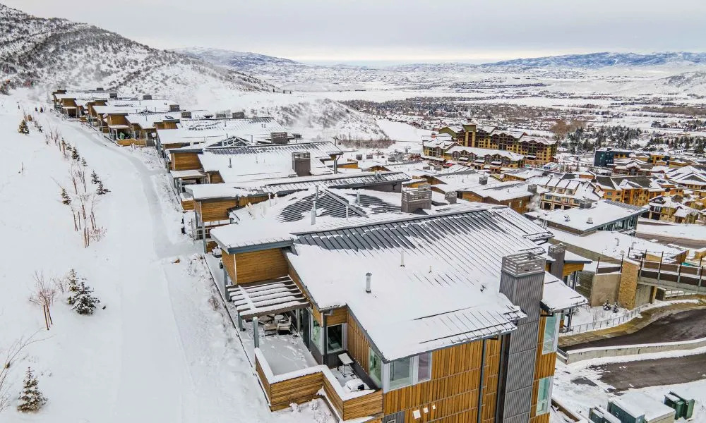 canyons village park city ski in ski out condos next to slopes winter aerial view