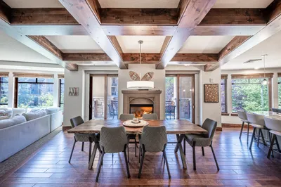 Modern Park City vacation rental interior with open layout, fireplace, and upscale finishes