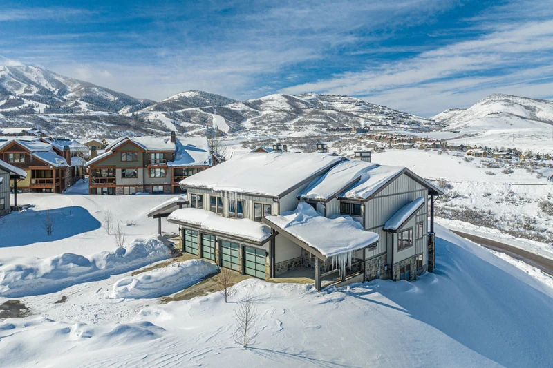 Aerial view of Mayflower Lakeside neighborhood near Deer Valley East Village and Jordanelle Reservoir in Park City