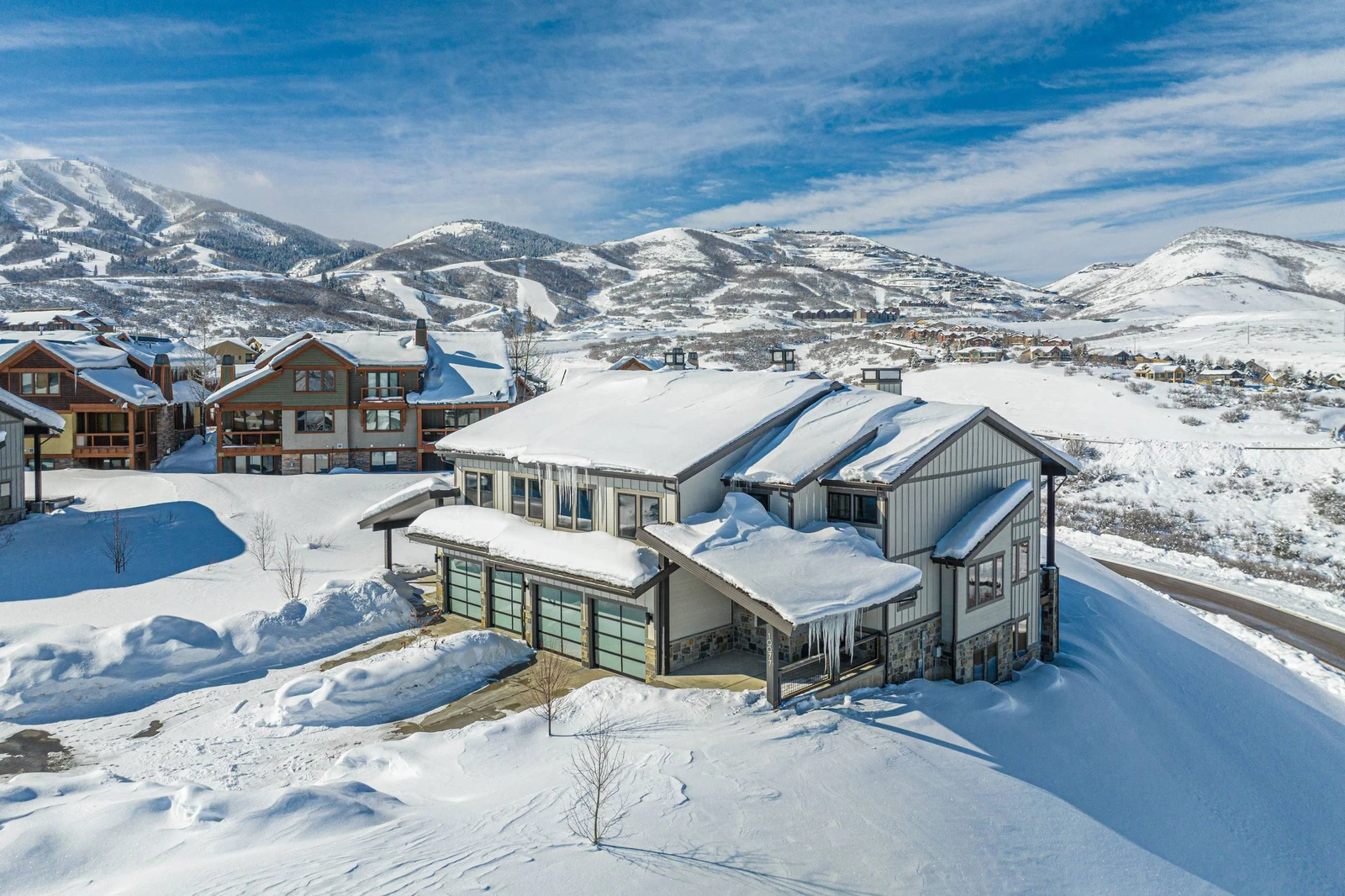 Aerial view of Mayflower Lakeside neighborhood near Deer Valley East Village and Jordanelle Reservoir in Park City