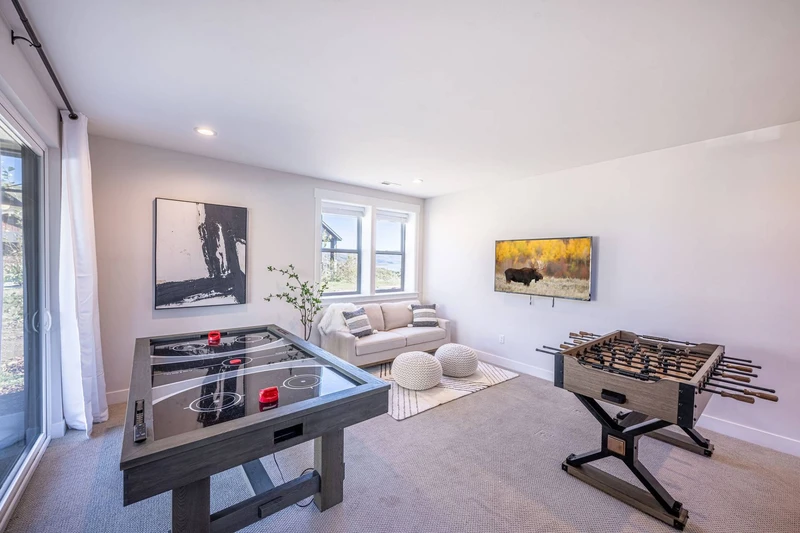 Are you ready to level up your vacation game? This home's game room is the ultimate oasis for fun-seekers