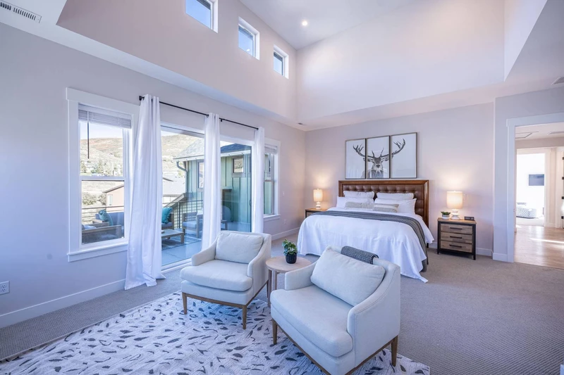 Experience ultimate luxury and comfort in our stunning primary bedroom, boasting a plush king-sized bed and a private balcony that offers breathtaking