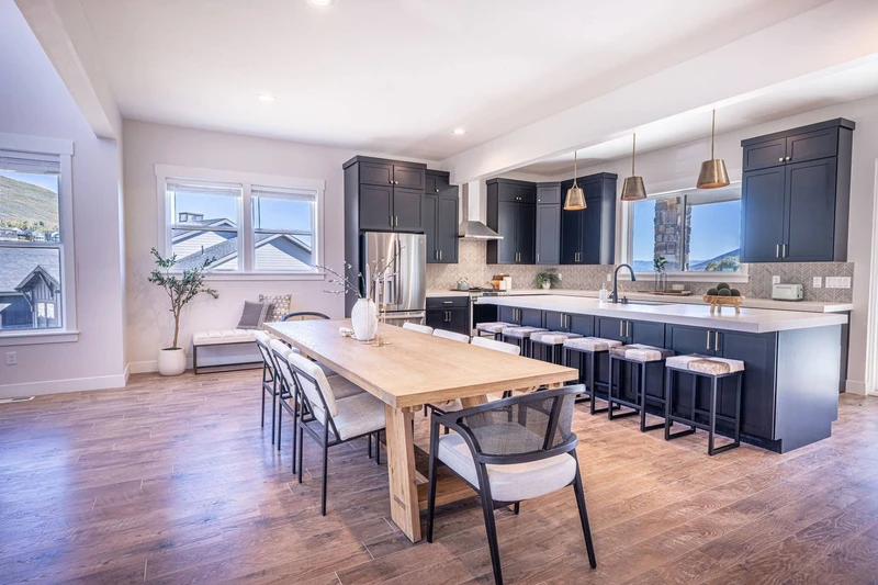 The large dining room and kitchen offer ample space for a bespoke dining experience with seating for 8 guests