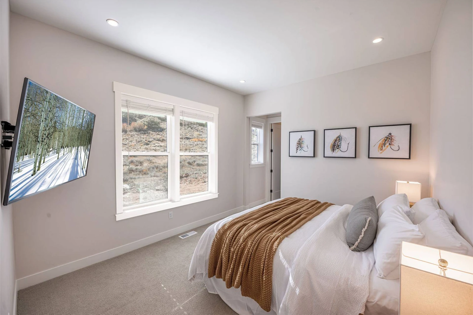 This king suite is just off the kitchen of the home and offers a private en suite bathroom and walk in closet