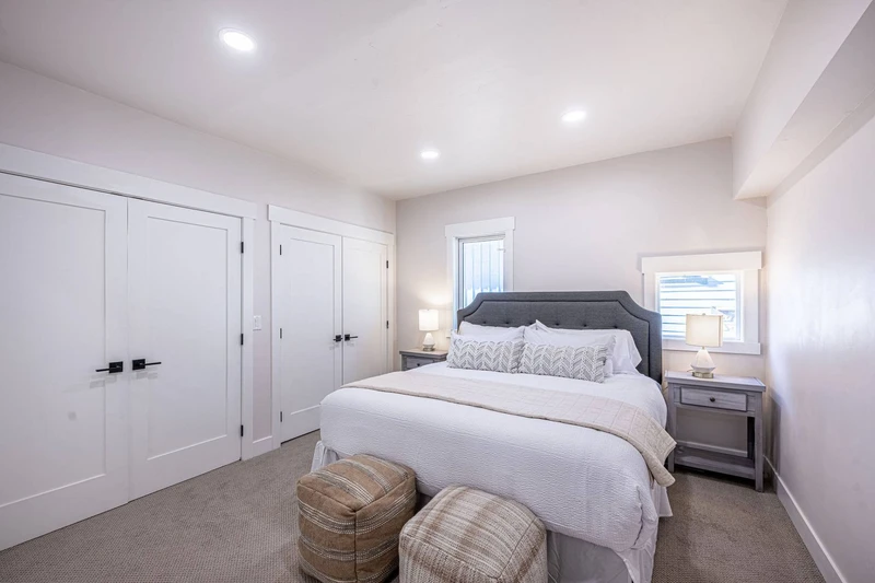 The king sized suite has a jack-and-jill shared bathroom attached with 2 oversized closets and is featured off of the theater room of the home