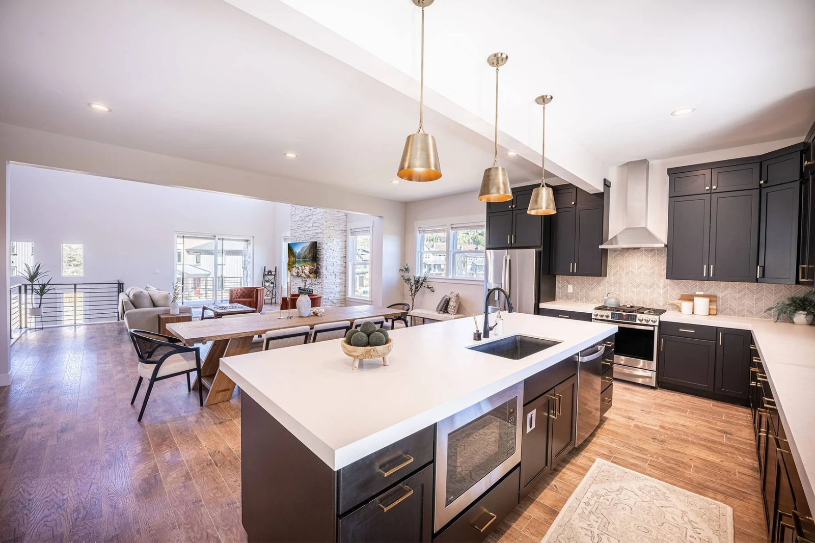 The microwave is featured in the island in the fully equipped kitchen