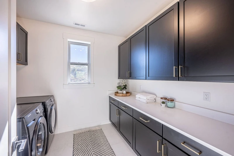 The large laundry room is available for guest use and it is located on the upper level of the home.