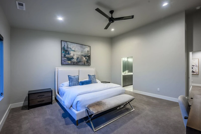 Upper level second Primary suite with King Bed, En Suite Bathroom with Lake and Mountain Views