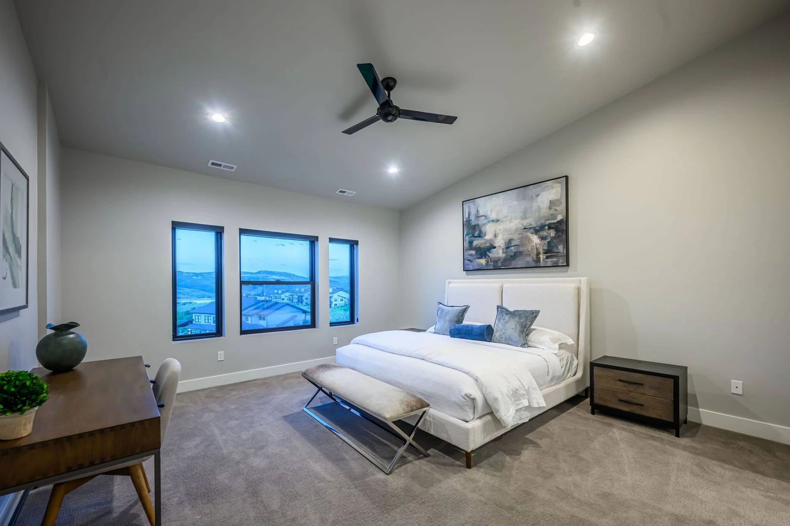 Second Primary Suite with King Bed, En Suite Bathroom, Mountain & Lake Views and a work from home space.
