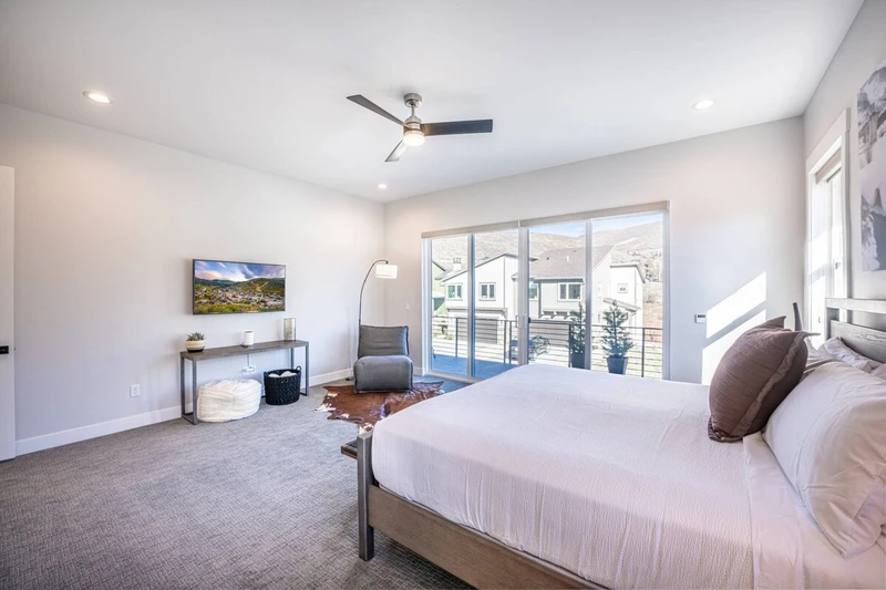 Enjoy your own tv in the primary suite of the home, there is also a comfortable space to sit and enjoy a book