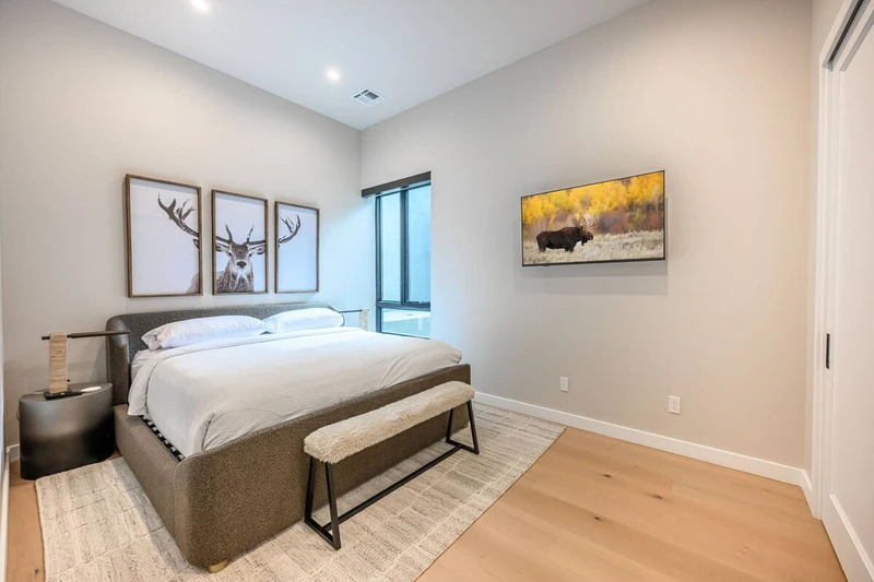 Guest suite with king bed in modern Park City vacation rental