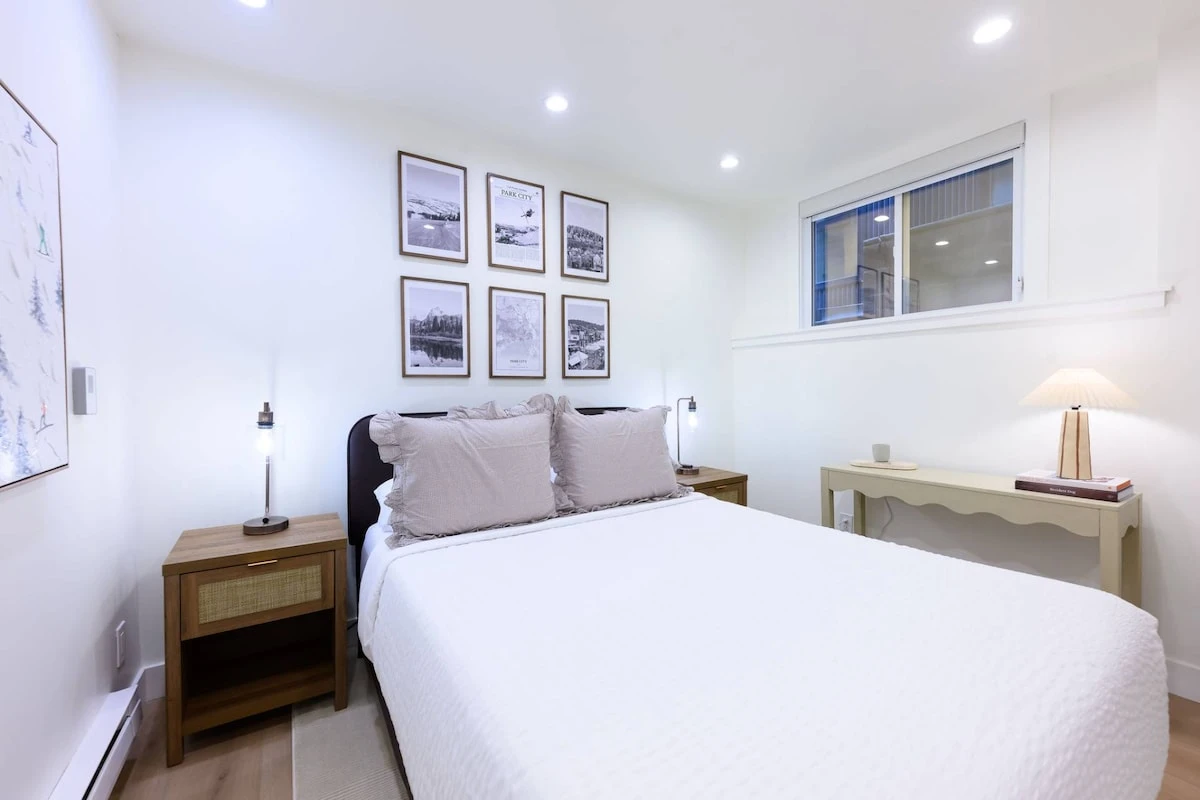 Guest Suite with bed and nearby full bathroom.