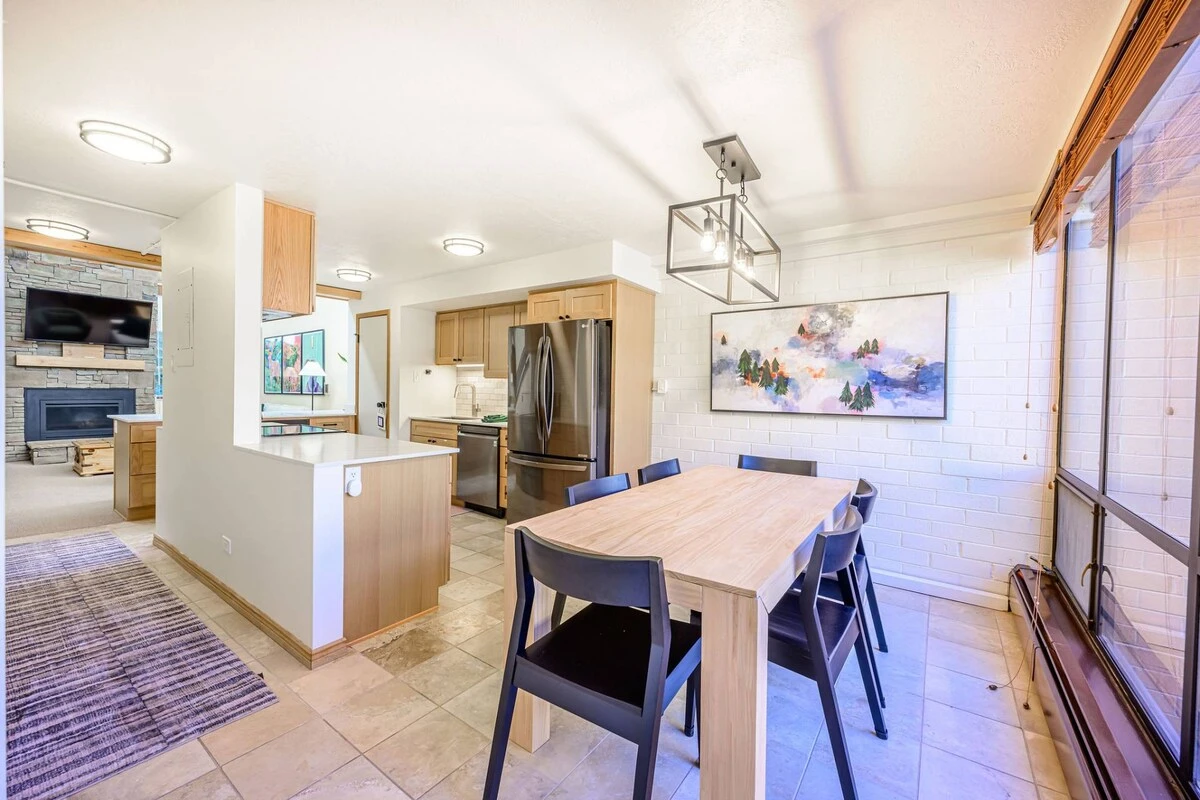 Dining Room with seating for up to 6 guests, additional seating at the breakfast bar is available