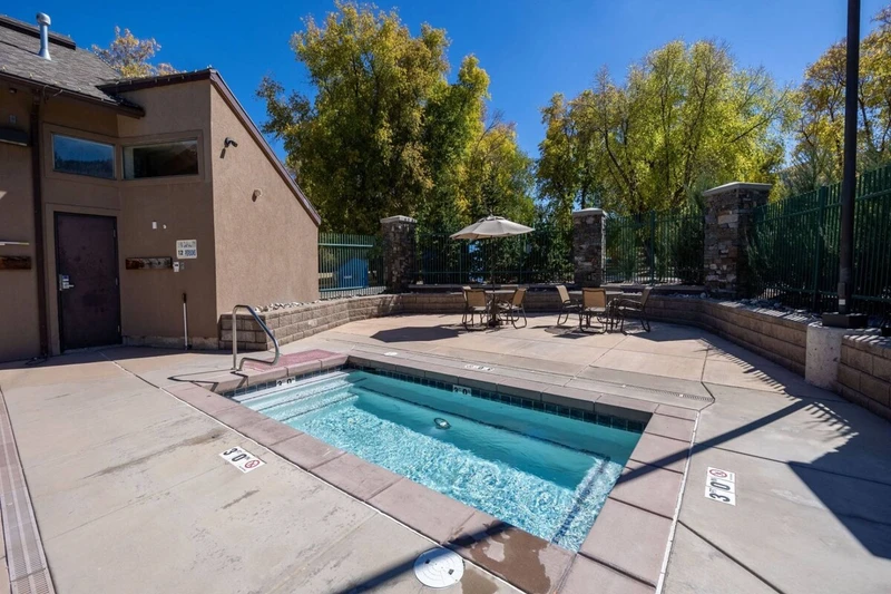 Park Ave Condos outdoor hot tub is open year round.