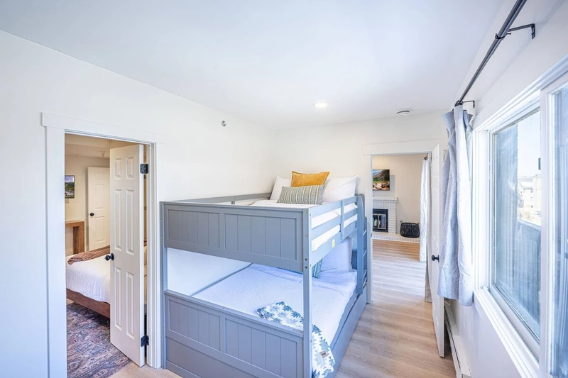 Guest Suite with twin bunkbeds and access to a full bathroom. Perfect for Families!