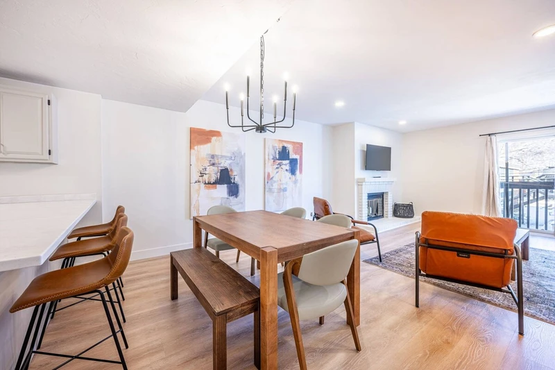 Open-concept living space connecting kitchen and dining area.