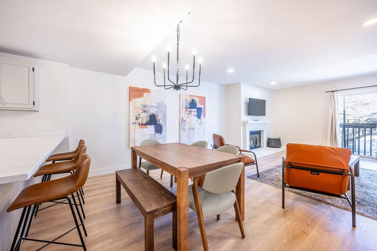 Open-concept living space connecting kitchen and dining area.
