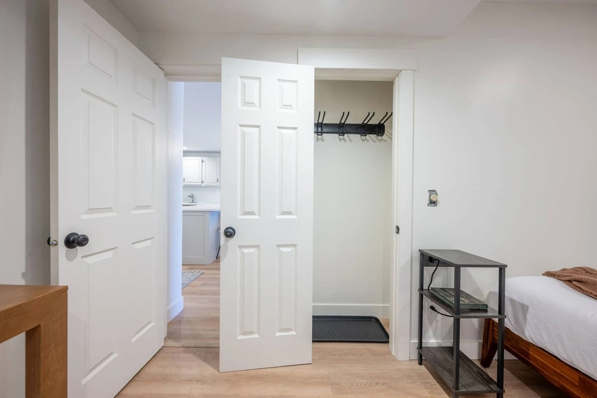 Primary Suite with comfortable layout and ski storage closet space.