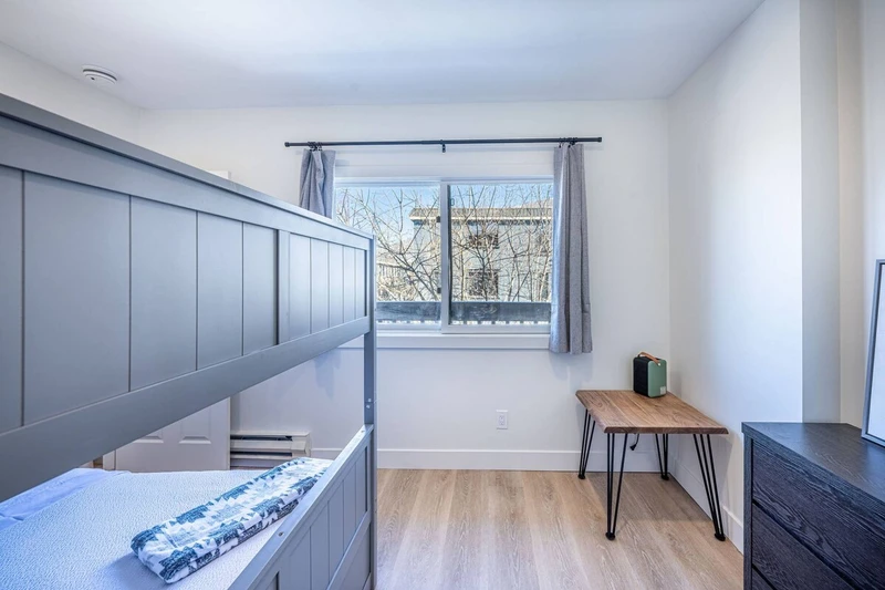 Guest Suite with twin beds and access to a full bathroom. Perfect for Families