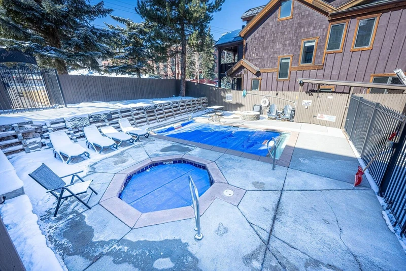 Hot tub and outdoor pool are available for guests at Snowblaze. Seasonal outdoor recreation available nearby.