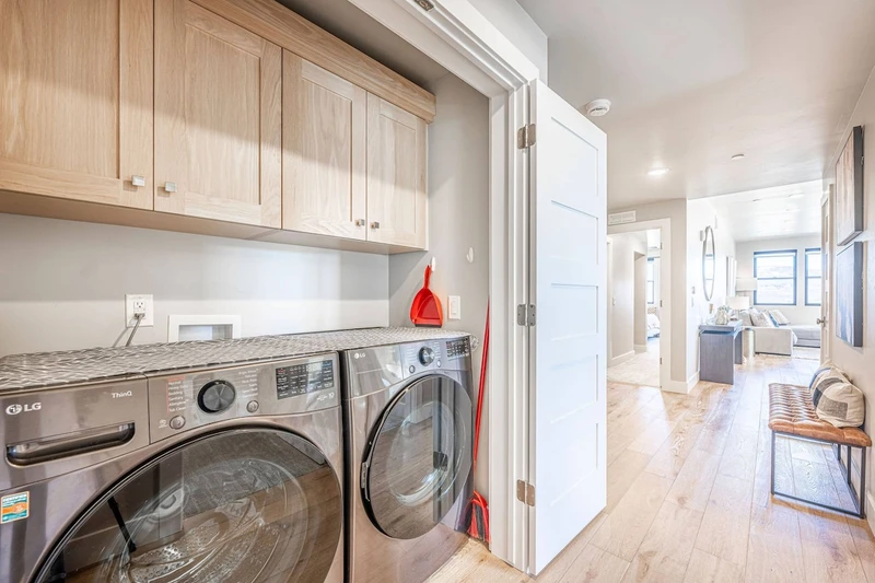 In-unit HE washer and dryer in Park City Mayflower Lakeside condo near Deer Valley East skiing.