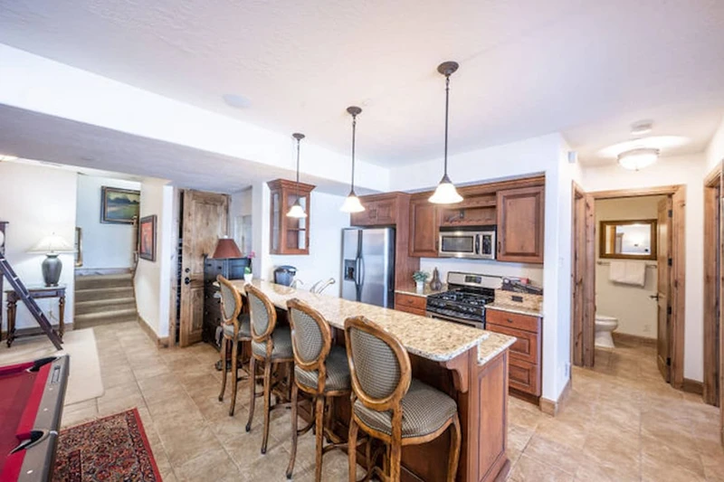 Lower level full kitchen; this home has 2 full kitchens