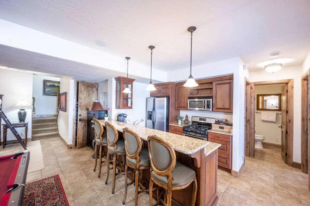 Lower level full kitchen; this home has 2 full kitchens