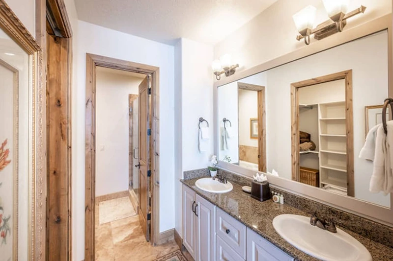 Main Floor primary suite with en suite bathroom and walk in closet