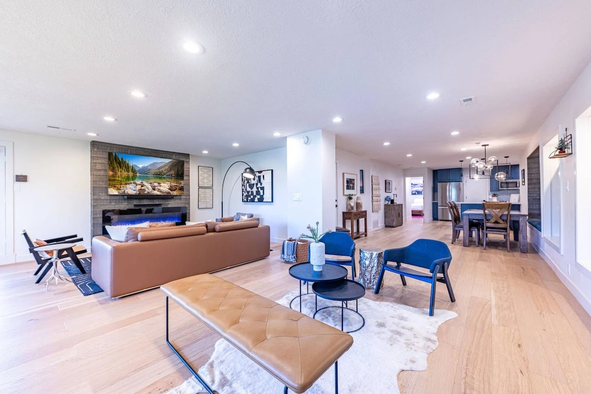 This home has multiple gathering spaces + private ski storage with boot/glove dryers.