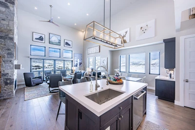 Large kitchen island with breakfast bar seating for group dining. 2 Minutes to Deer Valley East
