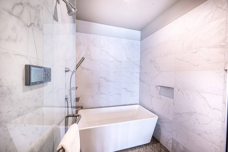 Spa-style bathroom with soaking tub in a luxury Park City home near Deer Valley East Village