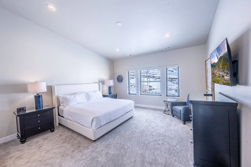 King bedroom in a luxury Park City home near Deer Valley East Village. Located on the upper floor with private full bathroom