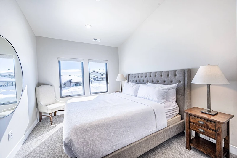 King guest bedroom with modern finishes in Mayflower Lakeside Park City