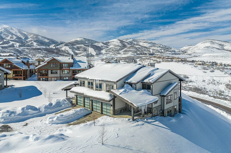 Aerial view of Mayflower Lakeside neighborhood near Deer Valley East Village and Jordanelle Reservoir in Park City