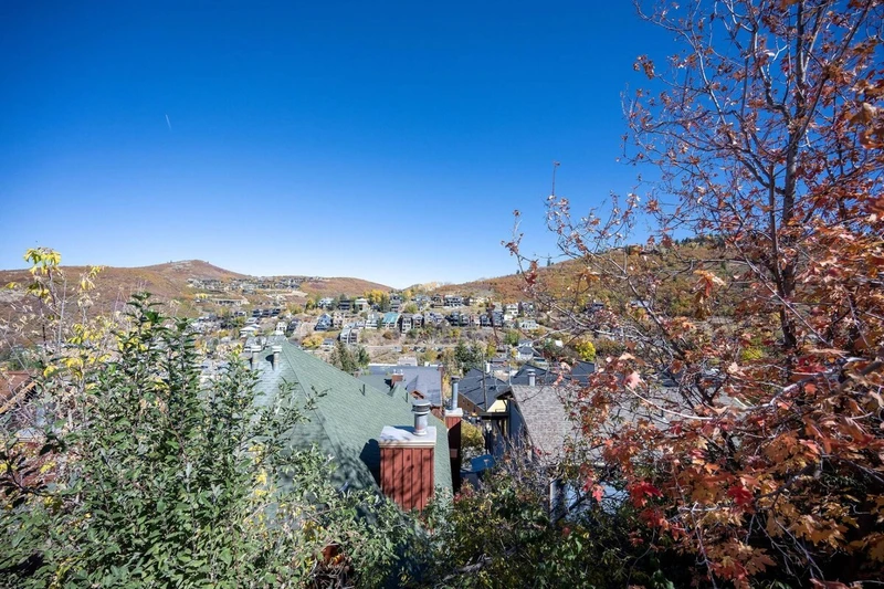 Views from the main floor deck. This home has the perfect location where you can walk to skiing without any stairs.