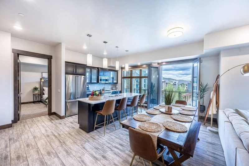 Luxury kitchen and dining area with open air doors to enjoy the mountain air