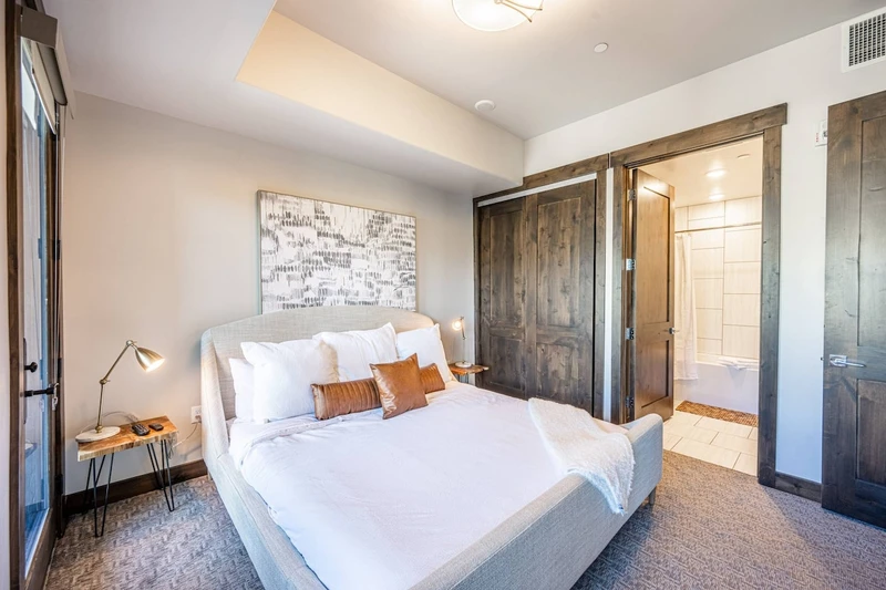 Guest Suite features a brand new king sized bed and en suite bathroom, full sized closet, fireplace, and private balcony