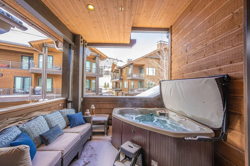Relax on your private balcony in the private hot tub and on the outdoor patio furniture.
