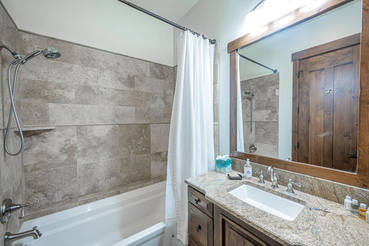 En Suite Bathroom Oversized Soaking Tub and large granite vanity